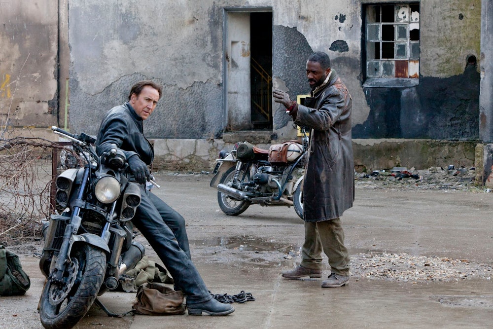 Nicolas Cage as Johnny Blaze and Idris Elba as Moreau - Ghost Rider: Spirit of Vengeance (2011) - Co...