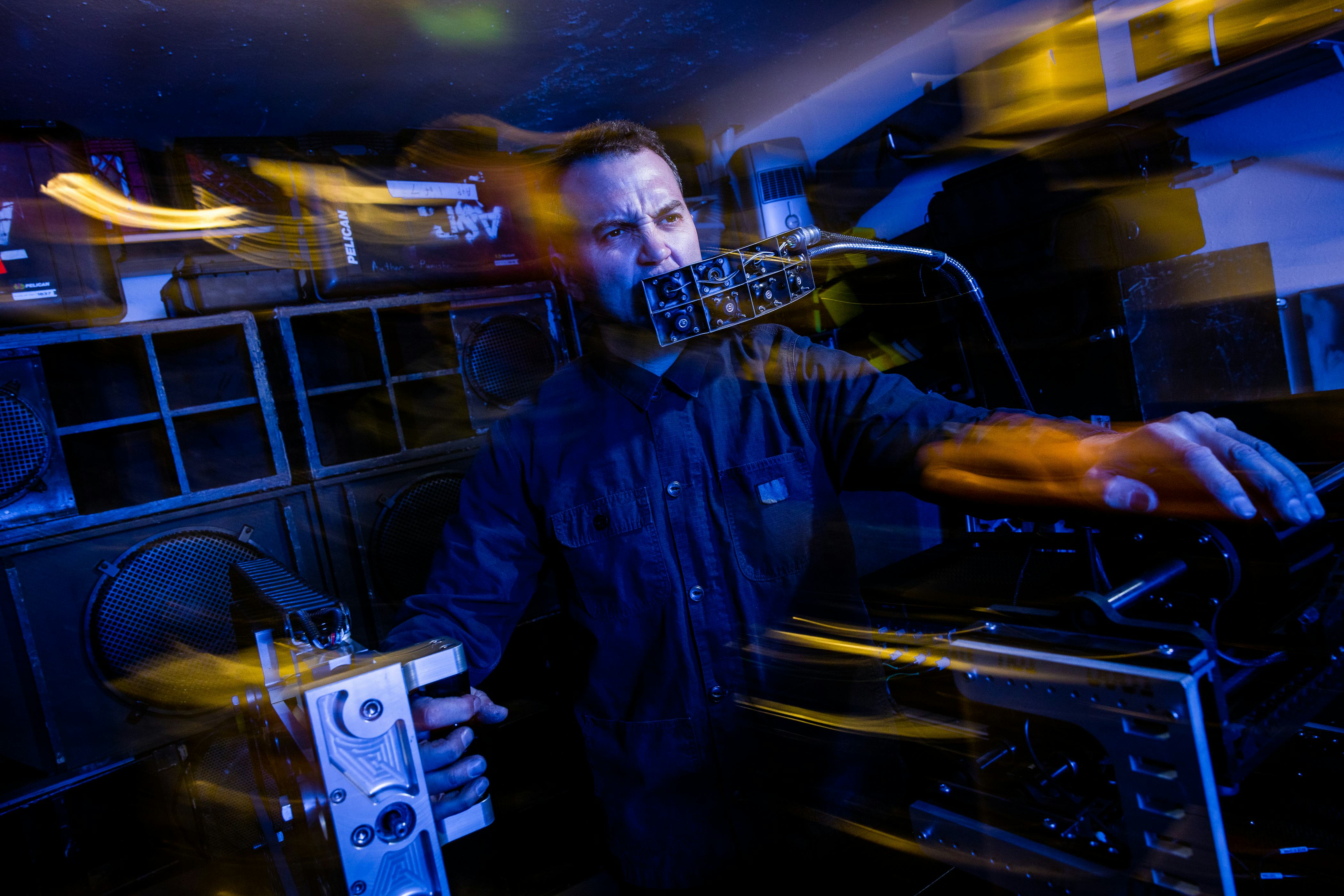 Tristan Shone aka Author & Punisher in his garage in San Diego