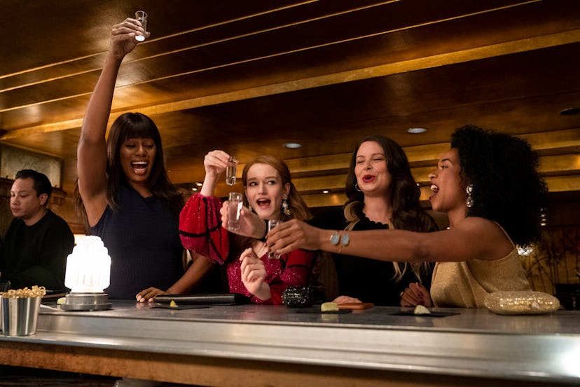 Laverne Cox as Kacy, Julia Garner as Anna Delvey, Katie Lowes as Rachel, Alexis Floyd as Neff in ‘In…