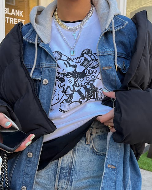 Rae Hershey in layers, including a Minnie and Mickey Mouse top.