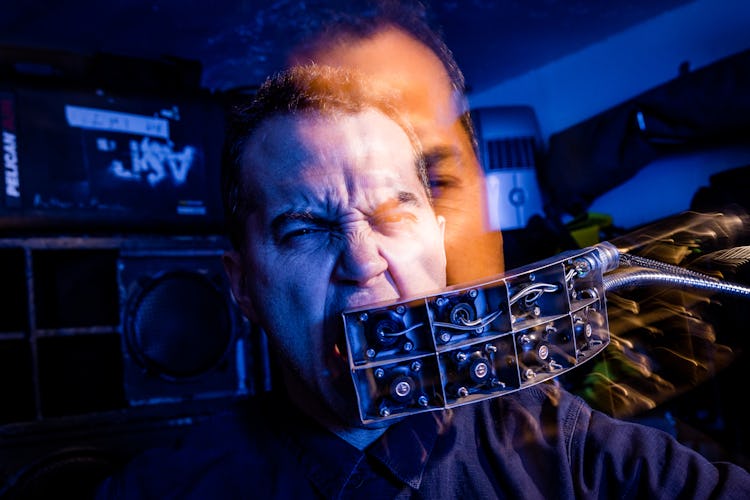 Tristan Shone aka Author & Punisher in his garage in San Diego