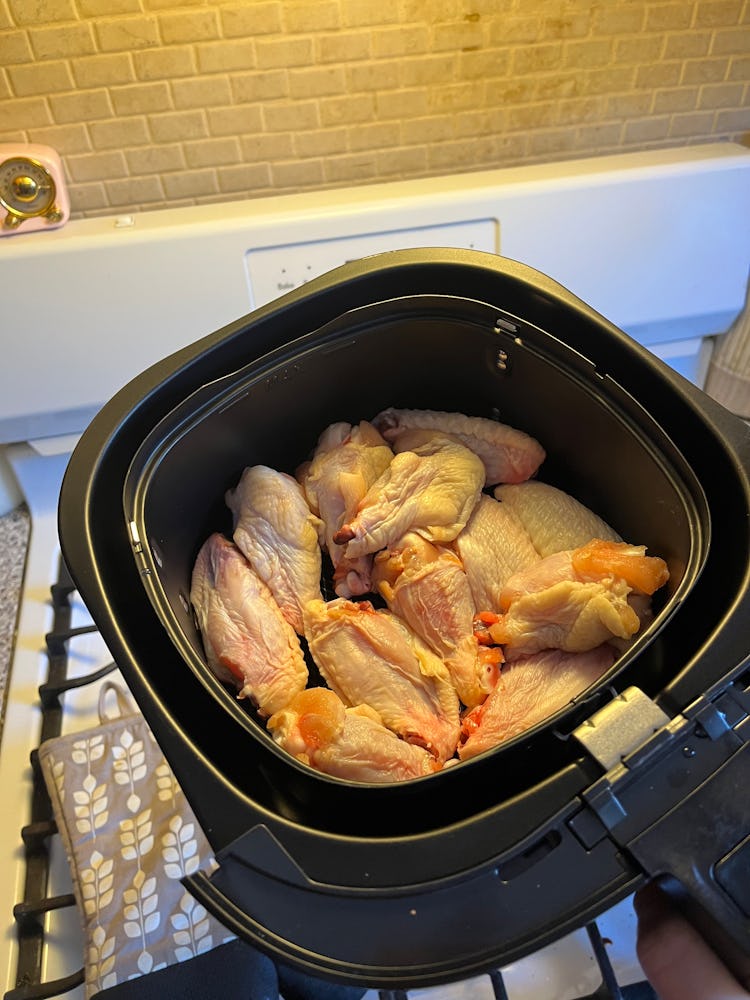 Wings in an air fryer.