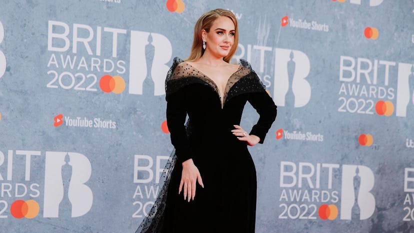 Adele posing on the BRIT Awards 2022 red carpet