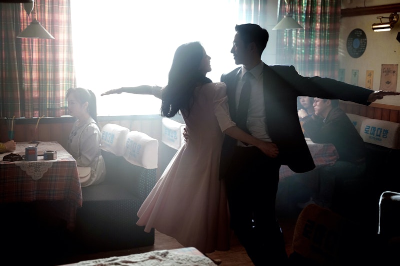 Lim Soo Ho (Jung Hae-In) and Eun Yeong-ro (Jisoo) performing a dance in a cafe in in Snowdrop
