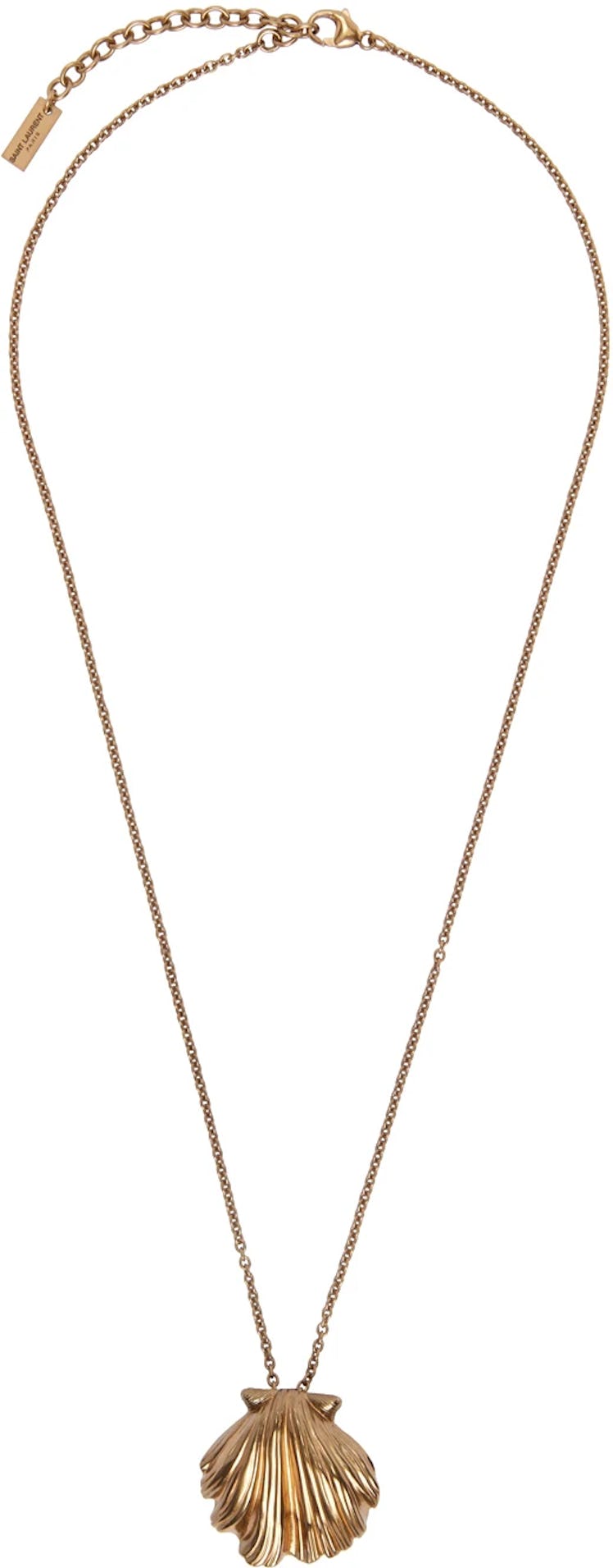 Saint Laurent's Gold Seashell Pendant Necklace. 
