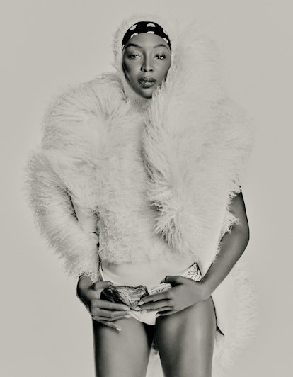 Naomi Campbell wearing a shearling vest 