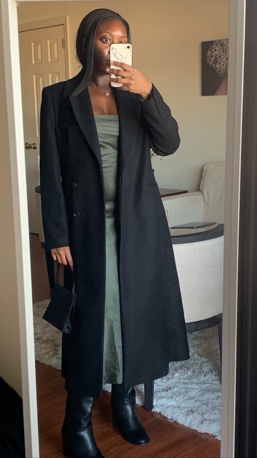 Long black coat over slip dress