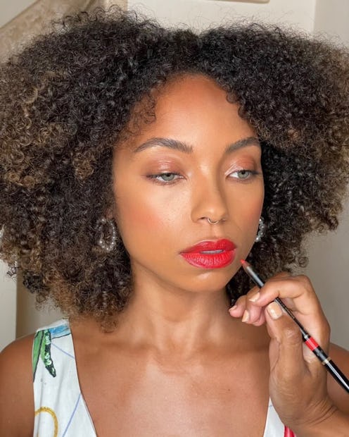 Logan Browning in Red lipstick 