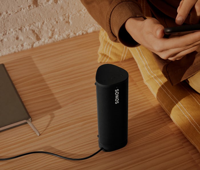 Sonos Roam SL being charged.