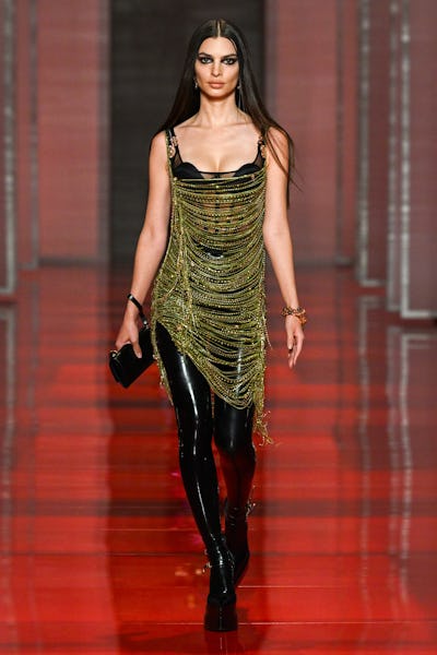 Emily Ratajkowski wearing a ruched rhinestone dress on the Versace runway