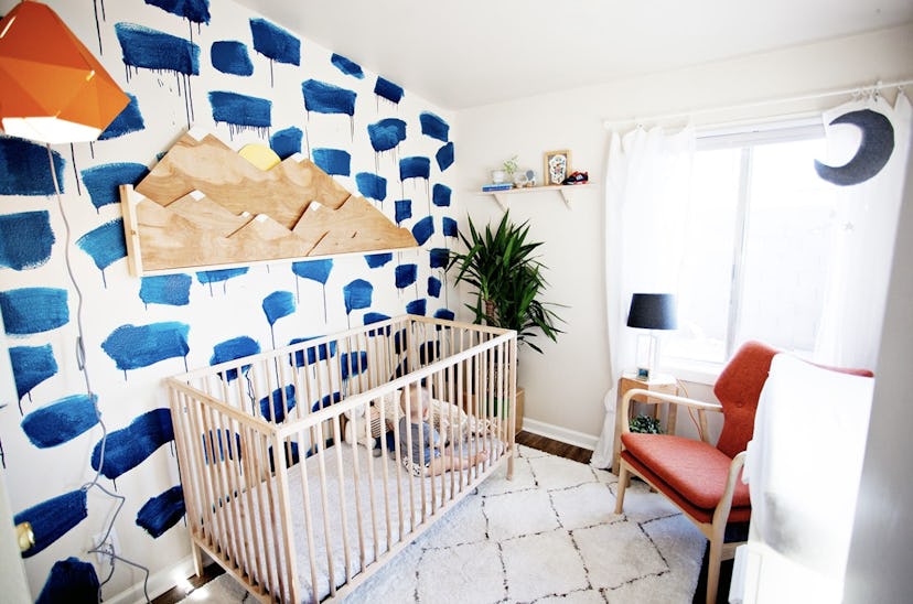 colorful gender neutral nursery with diy wallpaper paint