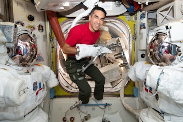 Astronaut Raja Chari tests using tools while wearing a spacesuit glove aboard the ISS recently.