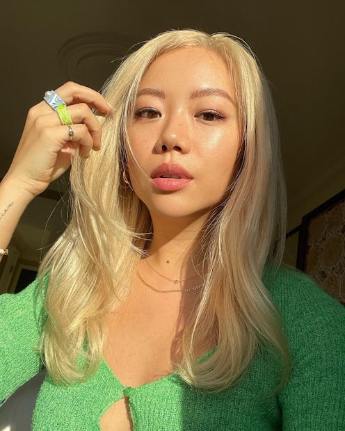 Woman in sunlight skin care selfie