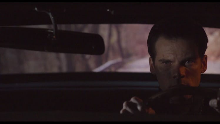 Greg Cohan as Doug Jones driving a car in "The VelociPastor"