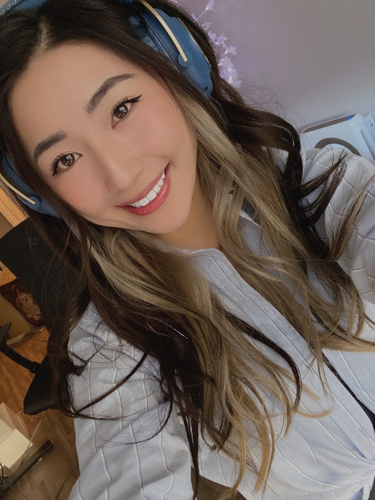 Selfie of Janet Rose wearing a blue gaming headset