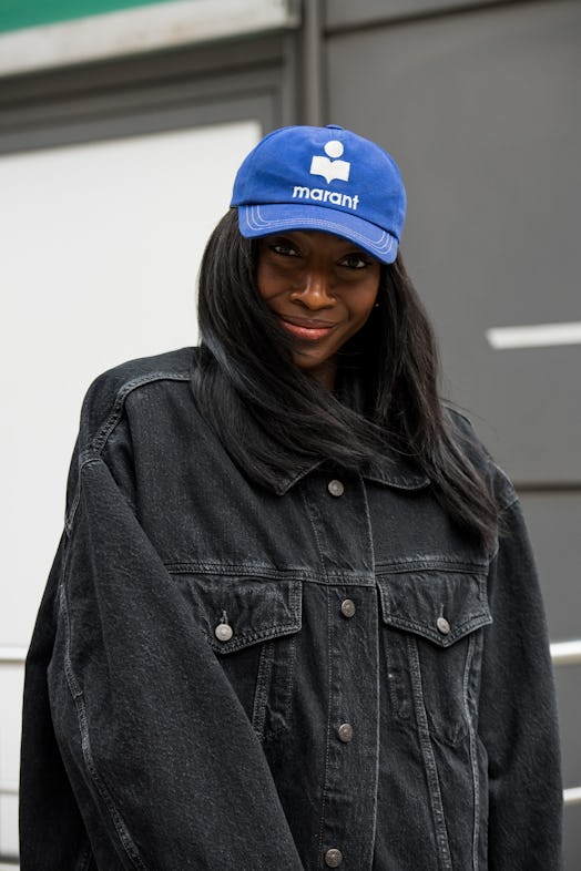 Georgia Medley wears an Isabel Marant cap and an Acne Studios jacket during London Fashion Week.  