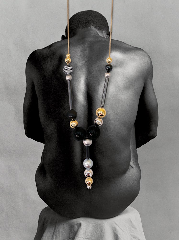 Repossi’s Relic necklace, inspired by one of Mapplethorpe’s pieces, in front of his 1981 photograph ...