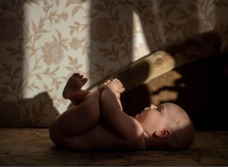 A Russian baby bathed in light