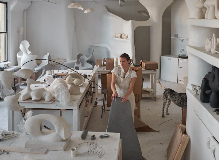 Simone Bodmer-Turner and her dog in their art studio