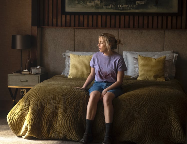 Jodie Comer as Villanelle sitting on a bed in Killing Eve season 4 episode 3