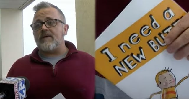 Assistant Principal Toby Price holding the book that he got fired for reading to second graders, 'I ...