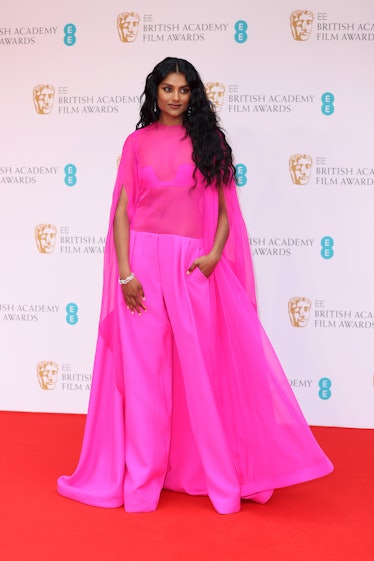 Simone Ashley wearing a pink Valentino gown at the BAFTA Awards 2022