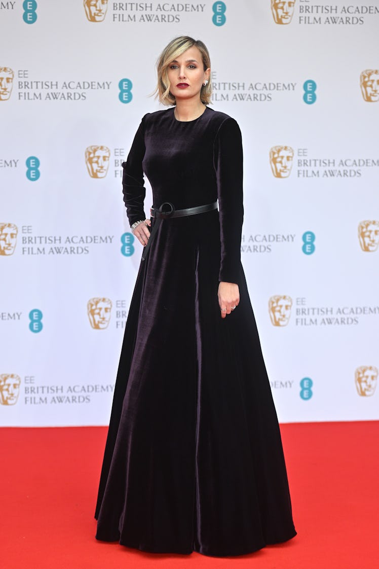 Julia Ducournau wearing a black velvet dress at the BAFTA Awards 2022