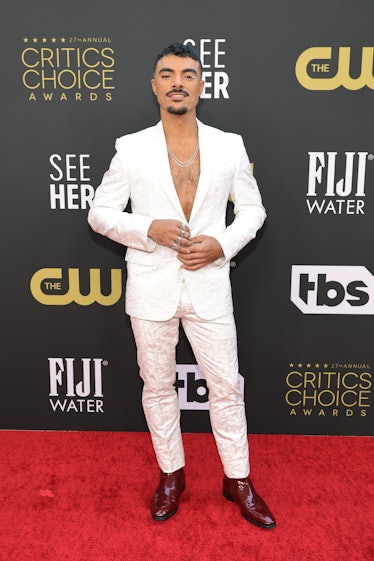 Yurel Echezarreta wearing a white suit sans shirt at the Critics Choice Awards 2022