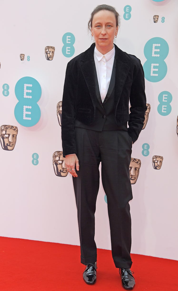 Céline Sciamma wearing a tuxedo at the BAFTA Awards 2022