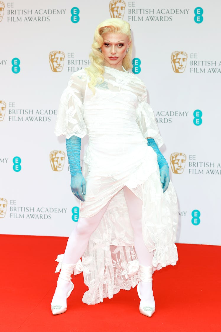 Bimini Bon-Boulash wearing sheer blue evening gloves at the BAFTA Awards 2022
