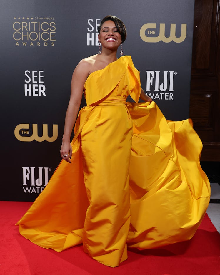 Ariana DeBose wearing a voluminous canary yellow gown at the Critics Choice Awards 2022