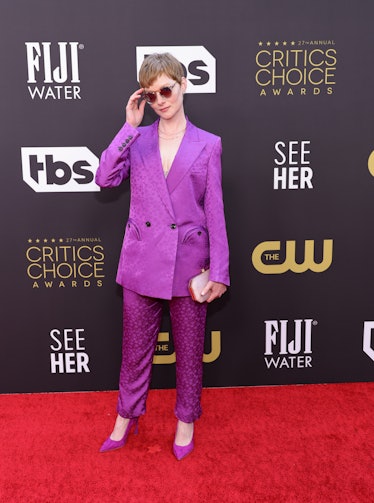 Wrenn Schmidt wearing a purple suit at the Critics Choice Awards 2022