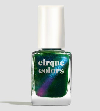 A dreamy cat eye nail look is just minutes away with this forest green metallic polish.