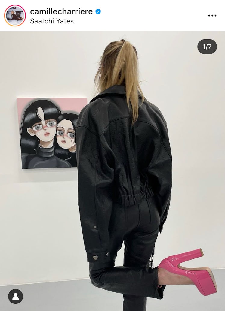 Fashion influencer Camille Charriere displays the "museum gaze" as none of the poses for Instagram a...