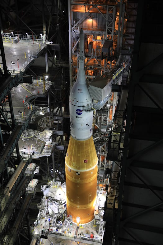 the Artemis I Space Launch System rocket and Orion spacecraft in preparation to roll out for testing...