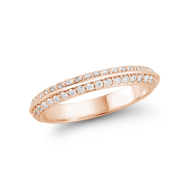 a rose gold knife edge band with diamond pave