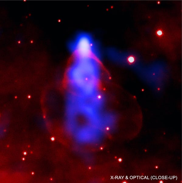 A small, powerful star that has unleashed 40 trillion mile-long beam of anti-matter in red and blue ...