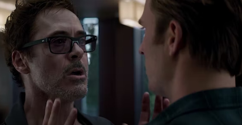 Robert Downey Jr. as Tony Stark arguing with Chris Evas as Captain America - Avengers: Endgame (2019...