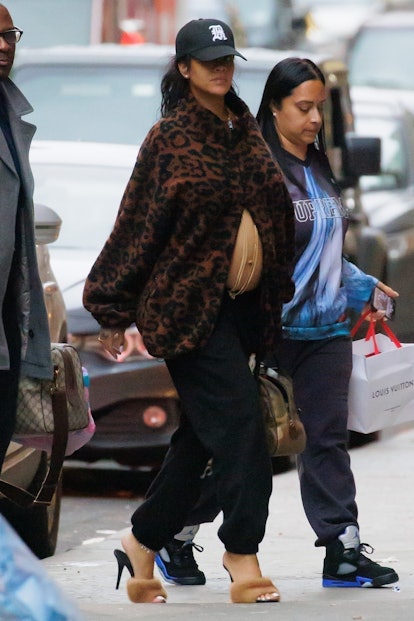 Rihanna's maternity outfit of a leopard coat.  