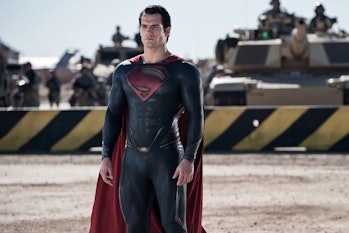 Henry Cavill standing in front of a tank in 2013's Man of Steel