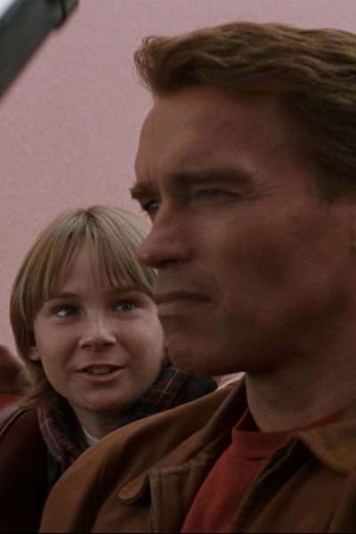 Arnold Schwarzenegger as Jack Slater and Austin O'Brien as Danny Madigan in Last Action Hero
