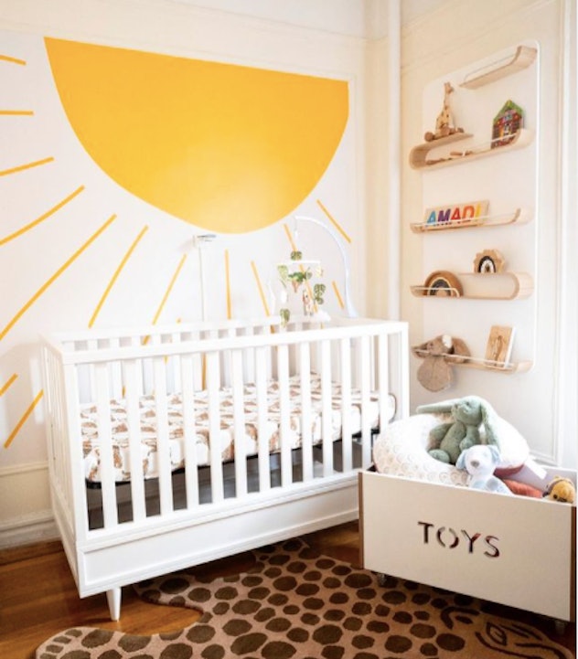 A sun mural baby boy nursery