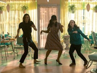 Three characters dancing in Umbrella Academy