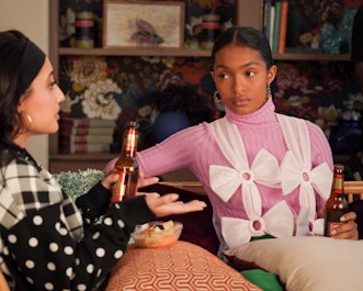 Zoey/grownish in a Forever 21 pink turtleneck, tulle ribbon suspenders and green pants.
