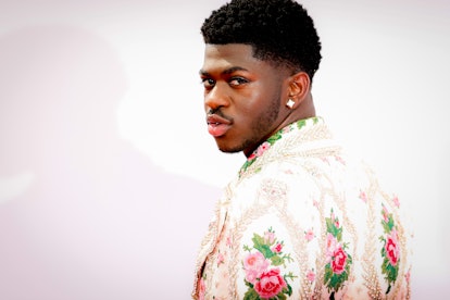 Lil Nas X looking over his shoulder