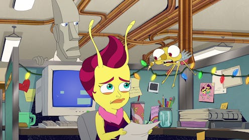 A screengrab of Emmy the Lovebug sitting in a cubicle and looking worried while Pete the Logic Rock ...