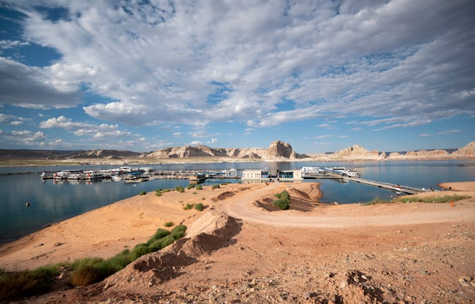 A dirt road leads down to the Stateline Marina on Lake Powell near Page, Arizona, on Wednesday, Aug....