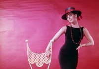 Actor Natalie Wood wears a black dress in 1962