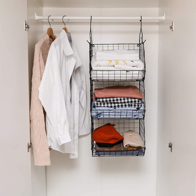 Tiered foldable closet organizer for clothes and accessories.