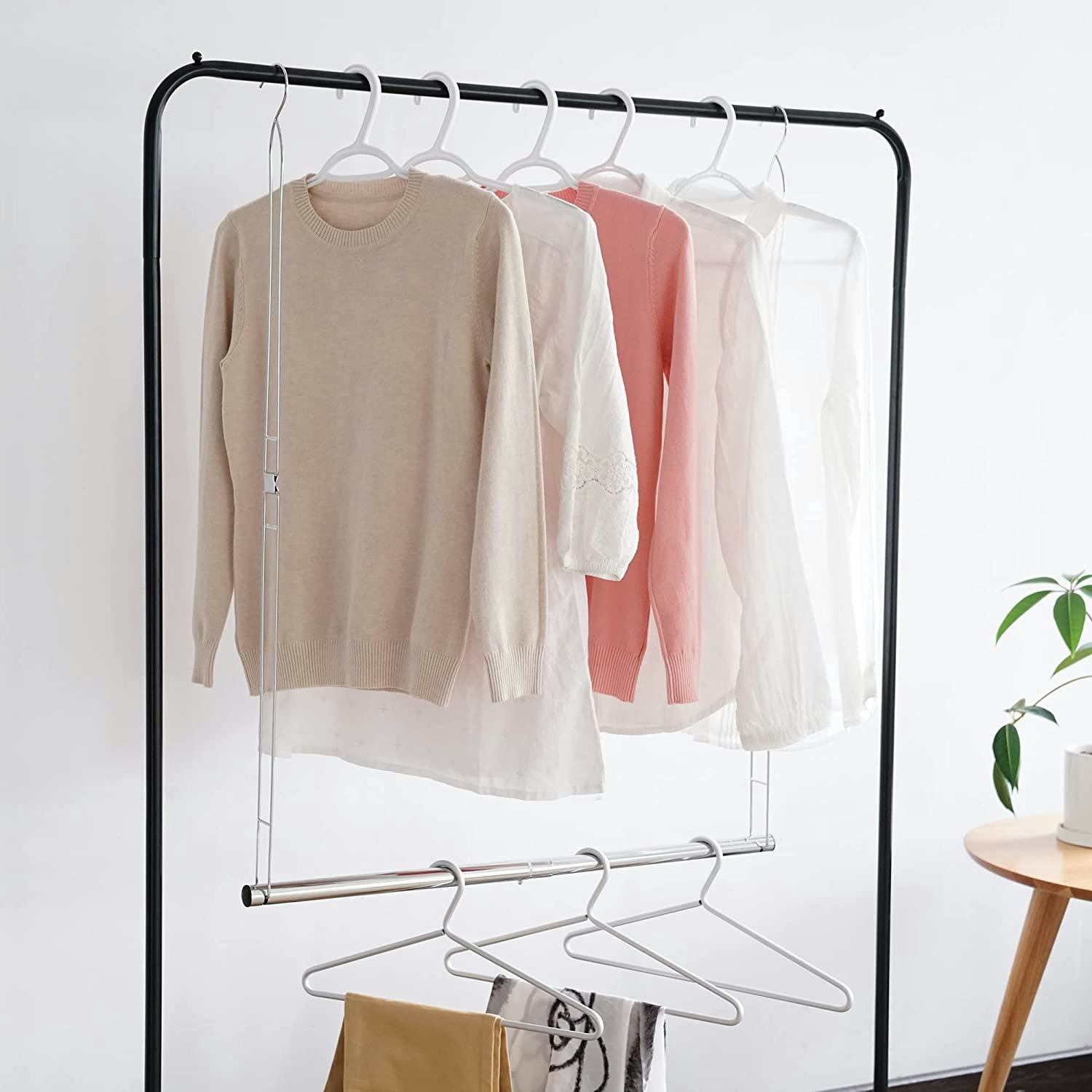 Hanging closet rod for space saving in the closet.